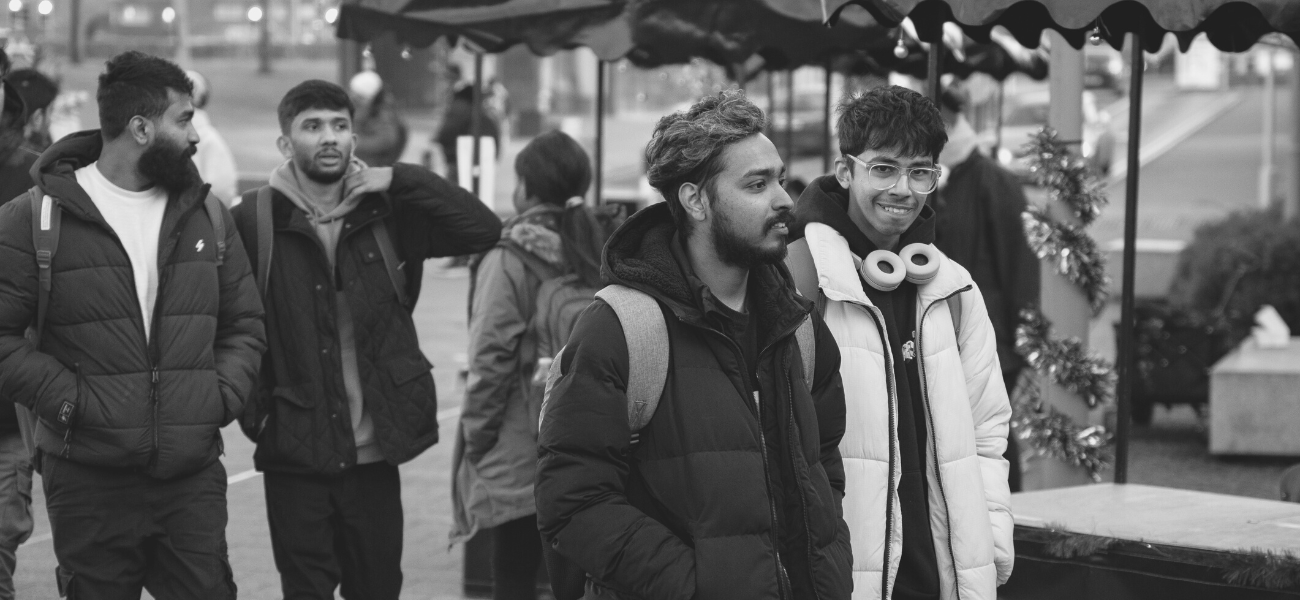 Picture of students walking through our Christmas Market