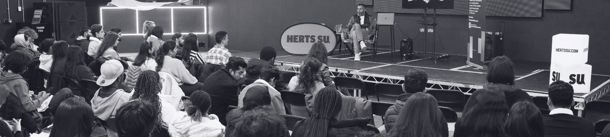 Students looking at the stage attending the Student Leader Conference