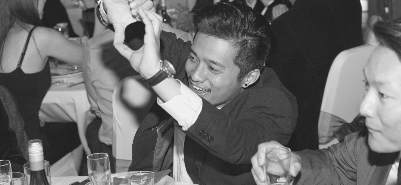 Male student celebrating award win