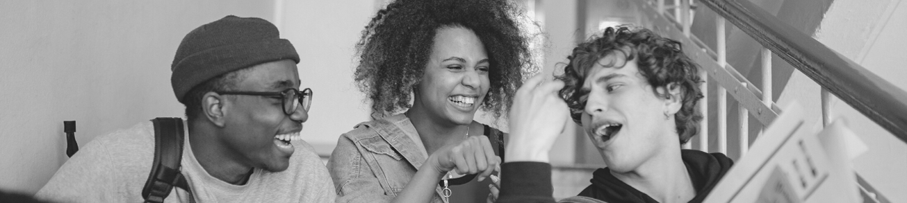 Students laughing in a corridor