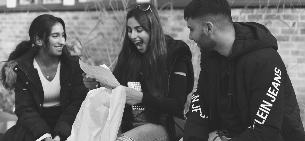 Students looking at a document