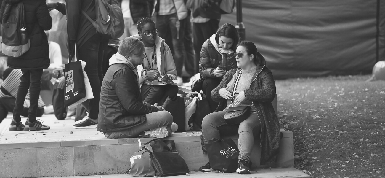 Students talking on steps