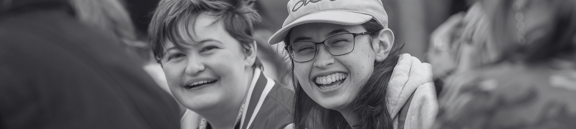 Two students smiling