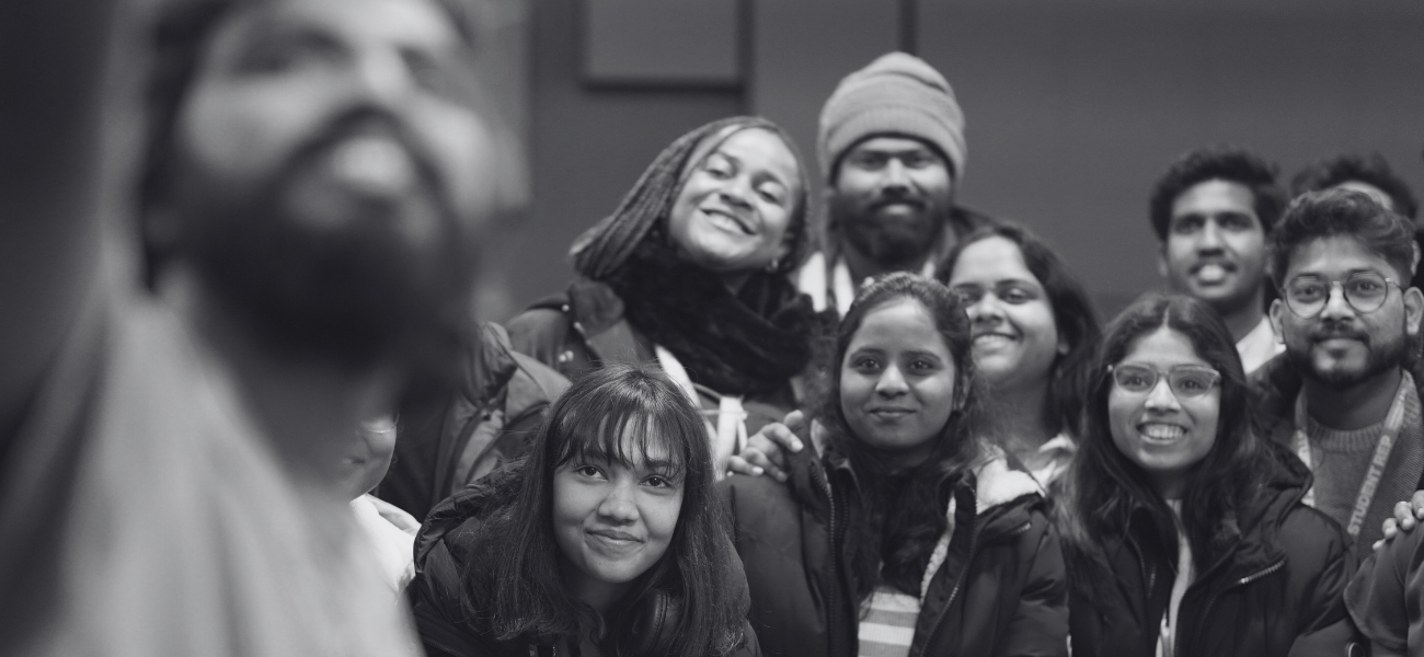 Person presenting to a group of people