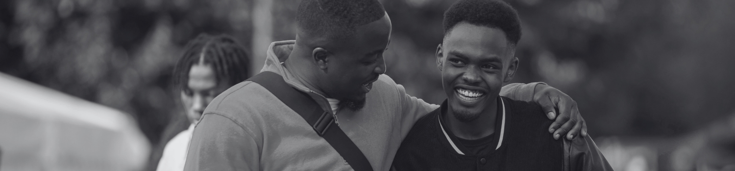 Students laughing at an event on campus