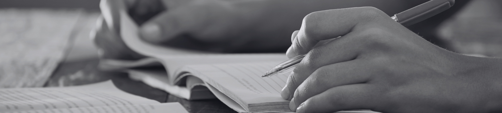 Person writing in a notebook