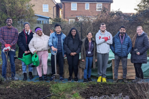 Students standing by their allotment