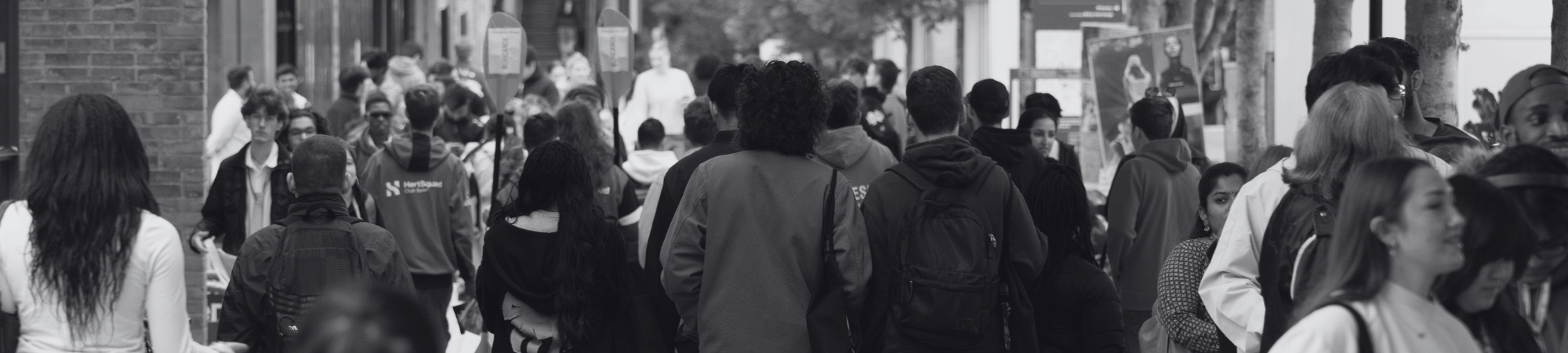 Large group of students walking outside